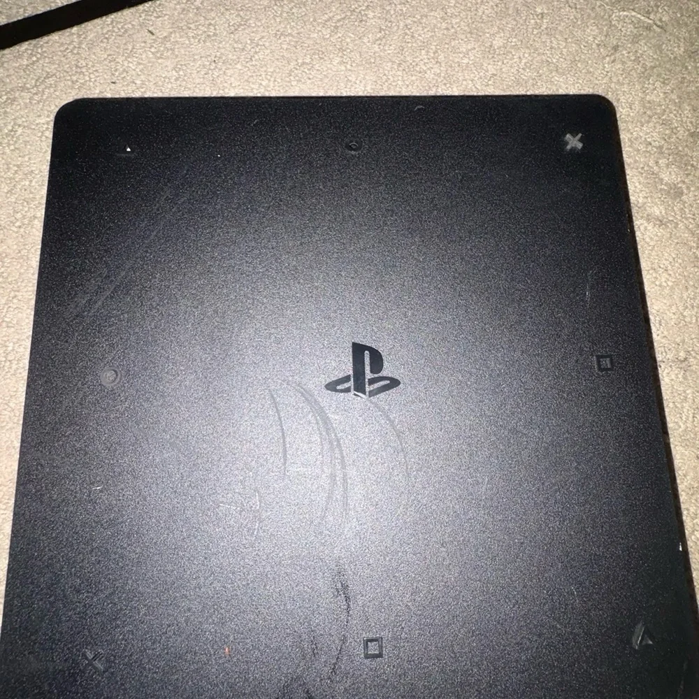 Ps4 with controller (including power cord and chargers) and 3 games